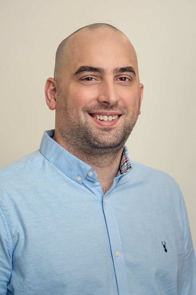 Portait photograph of Guillaume Butler-Laporte smiling